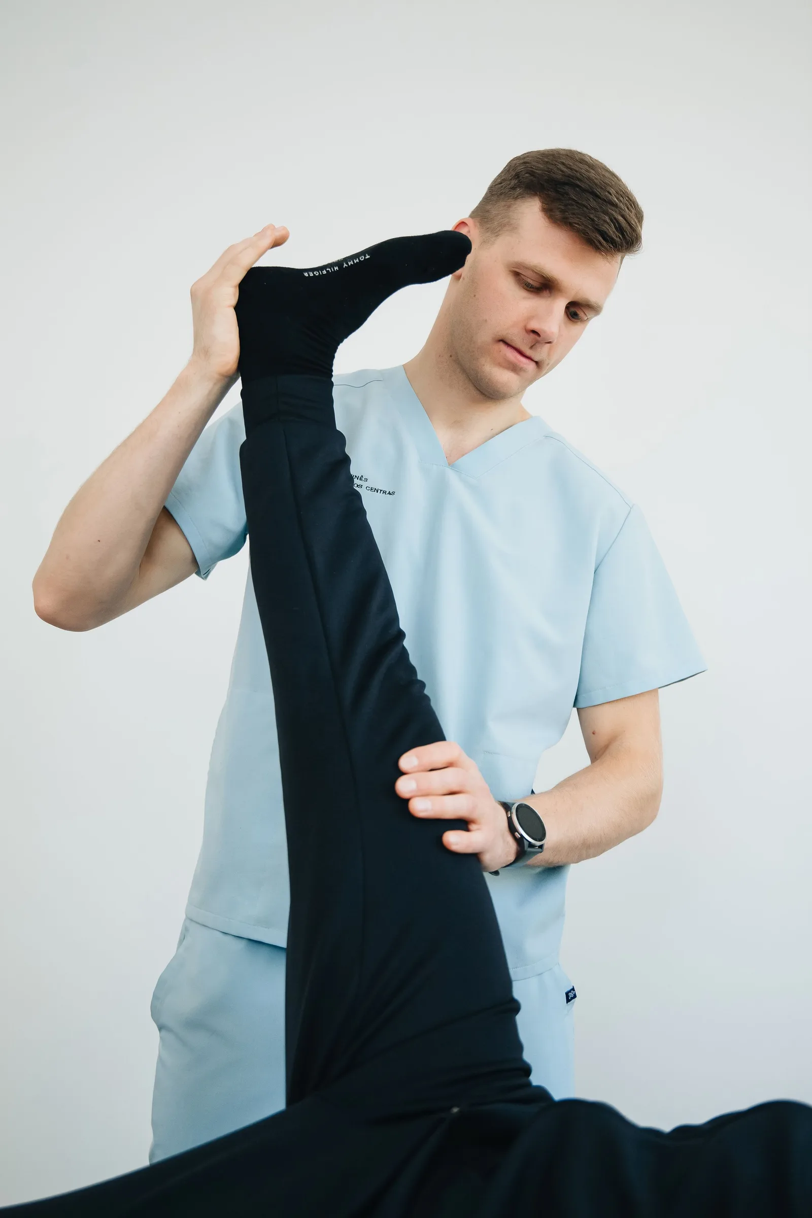 Accompagnement d’un étirement de la jambe
